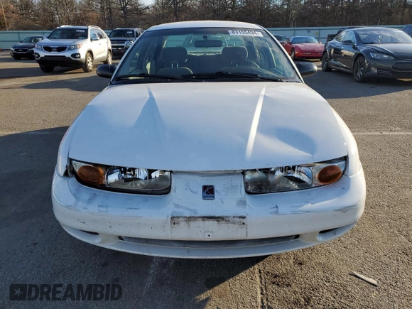 2001 Saturn SL z VIN 1G8ZK52771Z219294, wystawiony jako Copart lot #83155494 z przebiegiem 190 338 mil mil oraz Szkody całkowita. Historia ofert i sprzedaży dostępna na DreamBid. Obrazek 5.