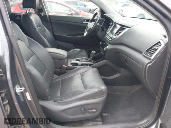 2016 Hyundai Tucson Eco with VIN KM8J3CA28GU217033, listed as a IAAI auction lot 41476238 with 76,311 mi miles. Bid and sale history available at carsss.com. Image 5.