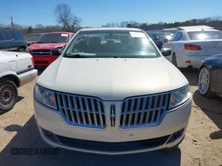 2012 Lincoln MKZ with VIN 3LNHL2GC4CR802198, listed as a IAAI auction lot 41703450 with 107,397 mi miles. Bid and sale history available at carsss.com. Image 12.