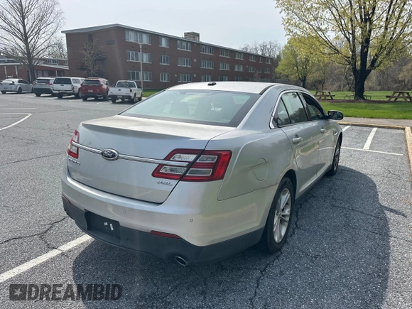 2013 Ford Taurus SEL with VIN 1FAHP2E85DG199414, listed as a Copart auction lot 54572685 with 122,416 mi miles and Clean Title. Bid and sale history available at carsss.com. Image 4.