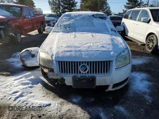 2007 Mercury Milan z VIN 3MEHM01157R637005, wystawiony jako Copart lot #88439165 z przebiegiem 170 741 mil mil oraz Szkody całkowita. Historia ofert i sprzedaży dostępna na DreamBid. Obrazek 5.