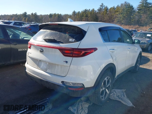 2020 Kia Sportage LX with VIN KNDPMCAC1L7830298, listed as a IAAI auction lot 41406343 with 89,076 mi miles. Bid and sale history available at carsss.com. Image 4.