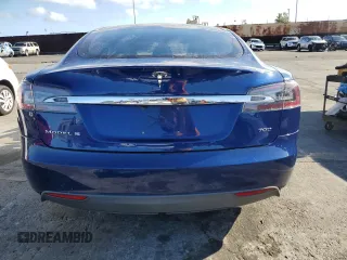 2015 Tesla Model S 85D with VIN 5YJSA1E21FF114010, listed as a Copart auction lot 48597885 with 196,670 mi miles and Salvage Title. Bid and sale history available at carsss.com. Image 6.
