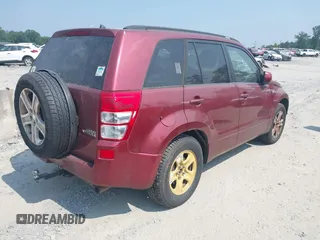 2006 Suzuki Grand Vitara Luxury z VIN JS3TE947164104865, wystawiony jako IAAI lot #42364904 z przebiegiem 189 000 mil mil oraz . Historia ofert i sprzedaży dostępna na DreamBid. Obrazek 4.