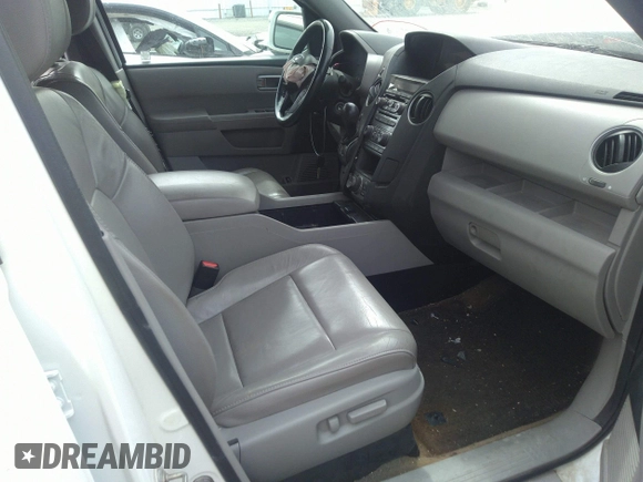 2015 Honda Pilot Touring with VIN 5FNYF4H9XFB047607, listed as a IAAI auction lot 41781534 with 157,252 mi miles. Bid and sale history available at carsss.com. Image 5.