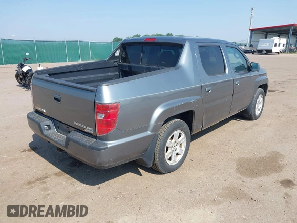 2009 Honda Ridgeline RTS z VIN 5FPYK16479B107114, wystawiony jako IAAI lot #42452199 z przebiegiem 206 853 mil mil oraz . Historia ofert i sprzedaży dostępna na DreamBid. Obrazek 4.