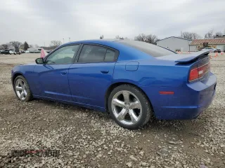 2012 Dodge Charger SXT with VIN 2C3CDXHG2CH244247, listed as a Copart auction lot 48321705 with 144,488 mi miles and Salvage Title. Bid and sale history available at DreamBid. Image 2.