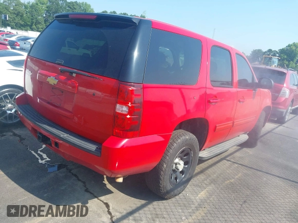 2013 Chevrolet Tahoe Commercial with VIN 1GNSK2E02DR167962, listed as a IAAI auction lot 42554839 with 158,634 mi miles and . Bid and sale history available at DreamBid. Image 4.