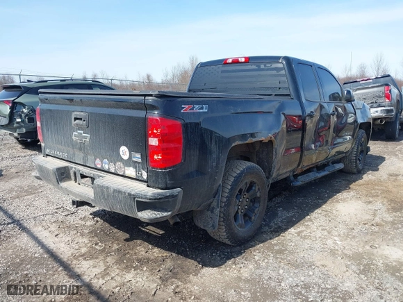 2017 Chevrolet Silverado 1500 LT with VIN 1GCVKREC1HZ285337, listed as a IAAI auction lot 41781910 with 136,895 mi miles. Bid and sale history available at carsss.com. Image 4.