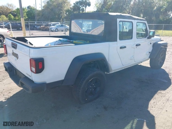 2021 Jeep Gladiator Willys with VIN 1C6HJTAG1ML619781, listed as a IAAI auction lot 41738452 with 62,400 mi miles. Bid and sale history available at carsss.com. Image 4.