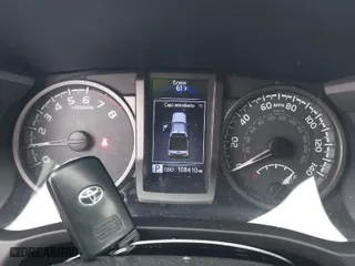 2019 Toyota Tacoma 4WD SR with VIN 5TFCZ5ANXKX204955, listed as a IAAI auction lot 41694378 with 108,410 mi miles. Bid and sale history available at carsss.com. Image 7.