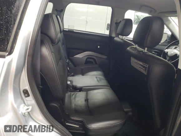 2010 Mitsubishi Outlander XLS z VIN JA4JT4AX9AZ002688, wystawiony jako Copart lot #51173605 z przebiegiem 162 147 mil mil oraz Szkoda całkowita • Salvage title. Historia ofert i sprzedaży dostępna na DreamBid. Obrazek 10.