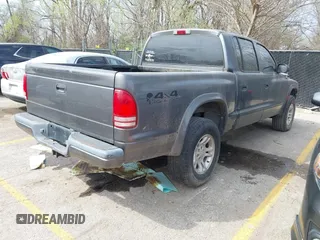 2002 Dodge Dakota Sport with VIN 1B7HG38N92S663249, listed as a IAAI auction lot 41912626 with 240,019 mi miles. Bid and sale history available at carsss.com. Image 4.