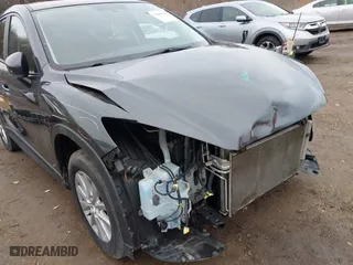 2016 Mazda CX-5 Touring with VIN JM3KE4CY7G0715507, listed as a IAAI auction lot 41699610 with 108,206 mi miles. Bid and sale history available at carsss.com. Image 6.