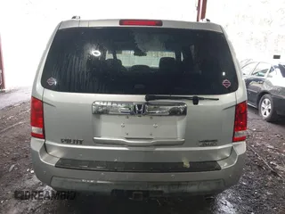 2011 Honda Pilot Touring with VIN 5FNYF4H90BB084692, listed as a IAAI auction lot 41867622 with 62,805 mi miles. Bid and sale history available at carsss.com. Image 16.