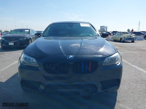 2013 BMW M5 with VIN WBSFV9C54DC772568, listed as a IAAI auction lot 41866486 with 99,072 mi miles. Bid and sale history available at carsss.com. Image 12.