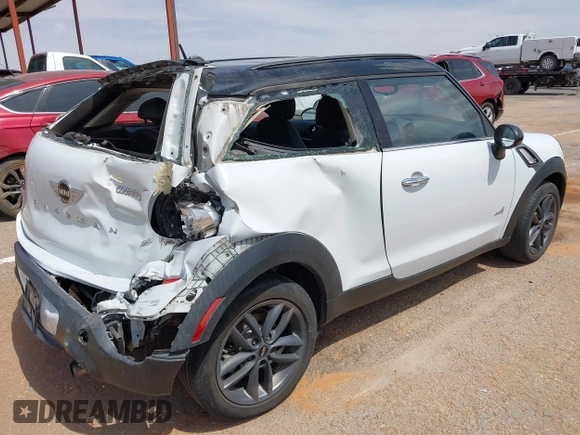 2013 MINI Paceman S ALL4 with VIN WMWSS7C51DWN51802, listed as a IAAI auction lot 41885786 with 96,386 mi miles and . Bid and sale history available at DreamBid. Image 4.