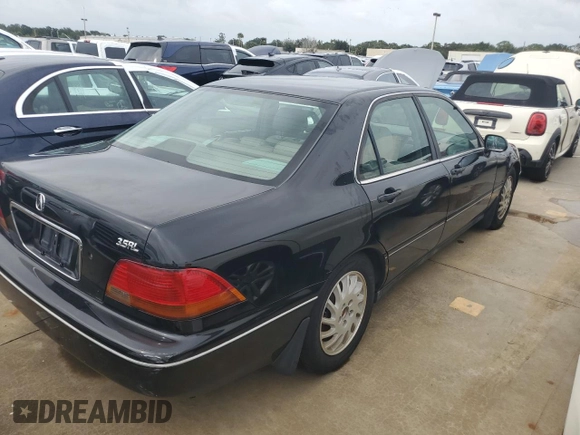 1998 Acura RL Premium with VIN JH4KA9656WC001298, listed as a Copart auction lot 73740154 with 108,066 mi miles and Salvage Title. Bid and sale history available at carsss.com. Image 3.