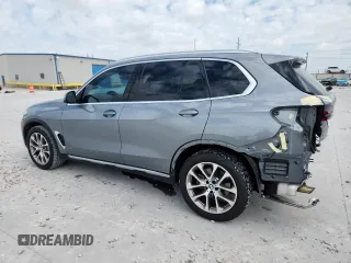 2024 BMW X5 xDrive40i with VIN 5UX23EU09R9T07066, listed as a Copart auction lot 61271495 with 18,042 mi miles and Salvage title. Bid and sale history available at DreamBid. Image 2.