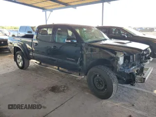 2015 Toyota Tacoma PreRunner with VIN 3TMKU4HN8FM043429, listed as a Copart auction lot 76530604 with 72,736 mi miles and Salvage title. Bid and sale history available at DreamBid. Image 4.