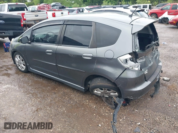 2011 Honda Fit Sport z VIN JHMGE8H51BC003715, wystawiony jako IAAI lot #42108476 z przebiegiem 174 228 mil mil oraz . Historia ofert i sprzedaży dostępna na DreamBid. Obrazek 3.