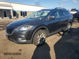 2014 Mazda CX-9 Sport with VIN JM3TB2BV0E0438396, listed as a Copart auction lot 46547455 with 111,521 mi miles and Salvage title. Bid and sale history available at DreamBid. Image 1.