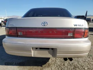 1994 Toyota Camry XLE with VIN JT2GK13E0R0017831, listed as a Copart auction lot 49887485 with 143,303 mi miles and Salvage Title. Bid and sale history available at carsss.com. Image 6.