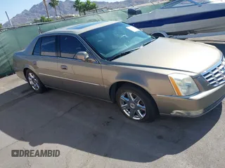 2007 Cadillac DTS Luxury I z VIN 1G6KD57Y97U198072, wystawiony jako IAAI lot #42315865 z przebiegiem 141 272 mil mil oraz . Historia ofert i sprzedaży dostępna na DreamBid. Obrazek 14.