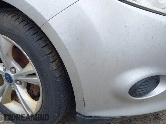 2013 Ford Focus SE with VIN 1FADP3F25DL348409, listed as a IAAI auction lot 42720571 with 121,136 mi miles and . Bid and sale history available at DreamBid. Image 12.