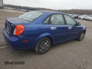 2006 Suzuki Forenza z VIN KL5JD56ZX6K372427, wystawiony jako Copart lot #80627544 z przebiegiem 94 493 mil mil oraz Tytuł czysty. Historia ofert i sprzedaży dostępna na DreamBid. Obrazek 3.