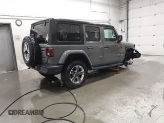 2019 Jeep Wrangler Unlimited Sahara with VIN 1C4HJXEG9KW656454, listed as a IAAI auction lot 41648236 with 75,403 mi miles and . Bid and sale history available at DreamBid. Image 4.