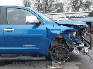 2016 Toyota Tundra SR z VIN 5TFRM5F13GX095535, wystawiony jako IAAI lot #41618316 z przebiegiem 131 386 mil mil oraz . Historia ofert i sprzedaży dostępna na DreamBid. Obrazek 20.