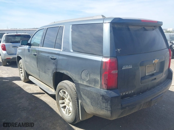 2019 Chevrolet Tahoe LT with VIN 1GNSKBKC6KR186865, listed as a IAAI auction lot 41801047 with 69,391 mi miles. Bid and sale history available at carsss.com. Image 3.