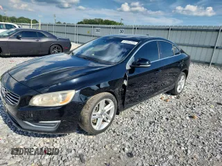 2014 Volvo S60 T5 with VIN YV1612FS8E2293017, listed as a Copart auction lot 63285295 with 234,027 mi miles and Salvage title. Bid and sale history available at DreamBid. Image 1.