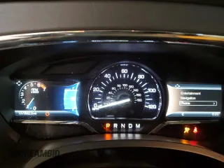 2015 Lincoln Navigator z VIN 5LMJJ2JT4FEJ00936, wystawiony jako Copart lot #56336775 z przebiegiem 157 892 mil mil oraz Szkoda całkowita • Salvage title. Historia ofert i sprzedaży dostępna na DreamBid. Obrazek 9.