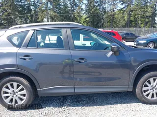 2015 Mazda CX-5 Sport z VIN JM3KE4BY5F0540612, wystawiony jako IAAI lot #42109082 z przebiegiem 83 874 mil mil oraz . Historia ofert i sprzedaży dostępna na DreamBid. Obrazek 14.