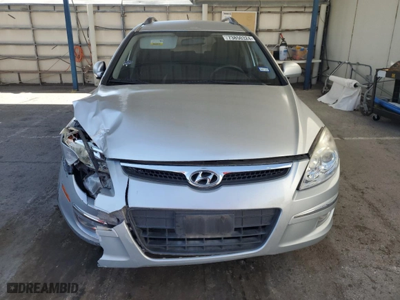 2010 Hyundai Elantra Touring SE with VIN KMHDC8AE7AU055228, listed as a Copart auction lot 73850324 with 88,407 mi miles and Salvage Title. Bid and sale history available at carsss.com. Image 5.