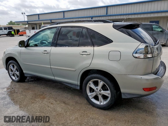 2006 Lexus RX 400h with VIN JTJGW31U260004024, listed as a Copart auction lot 57281205 with 166,426 mi miles and Clean title. Bid and sale history available at DreamBid. Image 2.