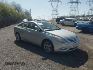 2012 Hyundai Sonata 2.4L Limited PZEV with VIN 5NPEC4AC2CH469899, listed as a IAAI auction lot 42008219 with 167,679 mi miles. Bid and sale history available at carsss.com. Image 1.