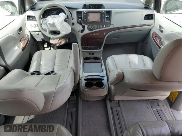 2011 Toyota Sienna XLE with VIN 5TDDK3DC1BS010411, listed as a Copart auction lot 51213065 with 174,214 mi miles and Salvage title. Bid and sale history available at DreamBid. Image 8.