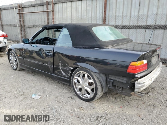 1999 BMW 3 Series 323icA with VIN WBABJ833XXEM22958, listed as a Copart auction lot 84696234 with 112,514 mi miles and Salvage Title. Bid and sale history available at carsss.com. Image 2.