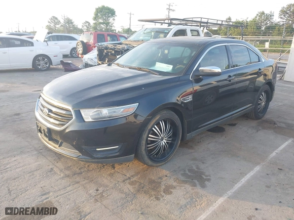 2013 Ford Taurus Limited with VIN 1FAHP2F83DG123026, listed as a IAAI auction lot 42058337 with 194,106 mi miles. Bid and sale history available at carsss.com. Image 2.
