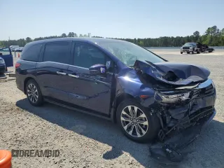 2023 Honda Odyssey EX-L z VIN 5FNRL6H66PB059463, wystawiony jako Copart lot #52288865 z przebiegiem Nie podano mil oraz Szkody całkowita. Historia ofert i sprzedaży dostępna na DreamBid. Obrazek 4.
