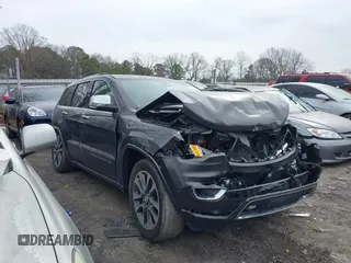 2017 Jeep Grand Cherokee Overland with VIN 1C4RJFCG8HC772837, listed as a IAAI auction lot 41304895 with 71,338 mi miles. Bid and sale history available at carsss.com. Image 1.