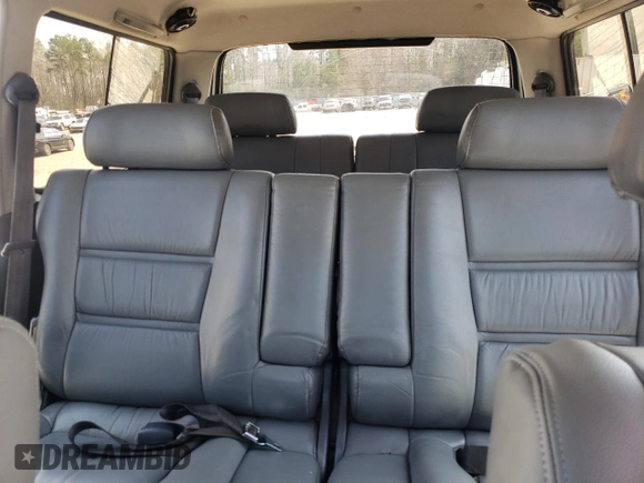 1995 Toyota Land Cruiser z VIN JT3DJ81W9S0112464, wystawiony jako Copart lot #49925395 z przebiegiem 215 698 mil mil oraz Czysty tytuł • Clean title. Historia ofert i sprzedaży dostępna na DreamBid. Obrazek 10.
