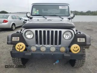 2004 Jeep Wrangler X with VIN 1J4FA39S74P724420, listed as a Copart auction lot 71839944 with 135,742 mi miles and Clean Title. Bid and sale history available at carsss.com. Image 5.