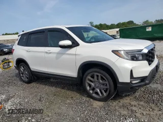 2023 Honda Passport EX-L with VIN 5FNYF8H58PB024039, listed as a Copart auction lot 57269725 with 44,705 mi miles and Salvage title. Bid and sale history available at DreamBid. Image 4.
