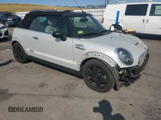 2012 MINI Convertible S z VIN WMWZP3C51CT296464, wystawiony jako Copart lot #64290005 z przebiegiem 107 580 mil mil oraz Szkoda całkowita • Salvage title. Historia ofert i sprzedaży dostępna na DreamBid. Obrazek 4.