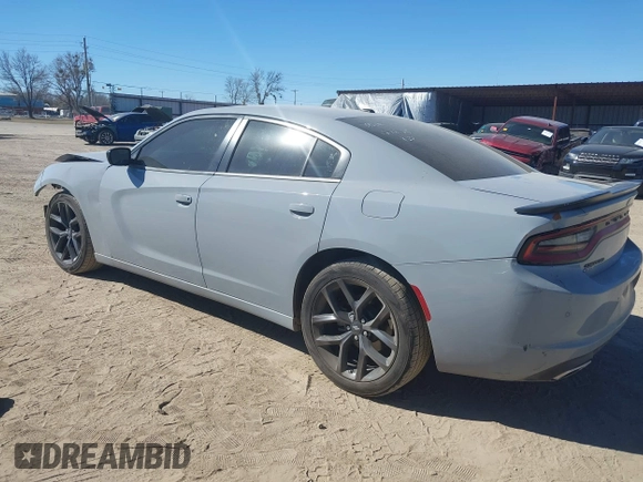 2022 Dodge Charger SXT with VIN 2C3CDXBG7NH208839, listed as a IAAI auction lot 41701171 with 71,552 mi miles and . Bid and sale history available at DreamBid. Image 3.
