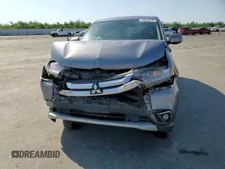 2018 Mitsubishi Outlander ES z VIN JA4AZ3A34JJ003445, wystawiony jako Copart lot #55850775 z przebiegiem 133 644 mil mil oraz Szkoda całkowita • Salvage title. Historia ofert i sprzedaży dostępna na DreamBid. Obrazek 14.